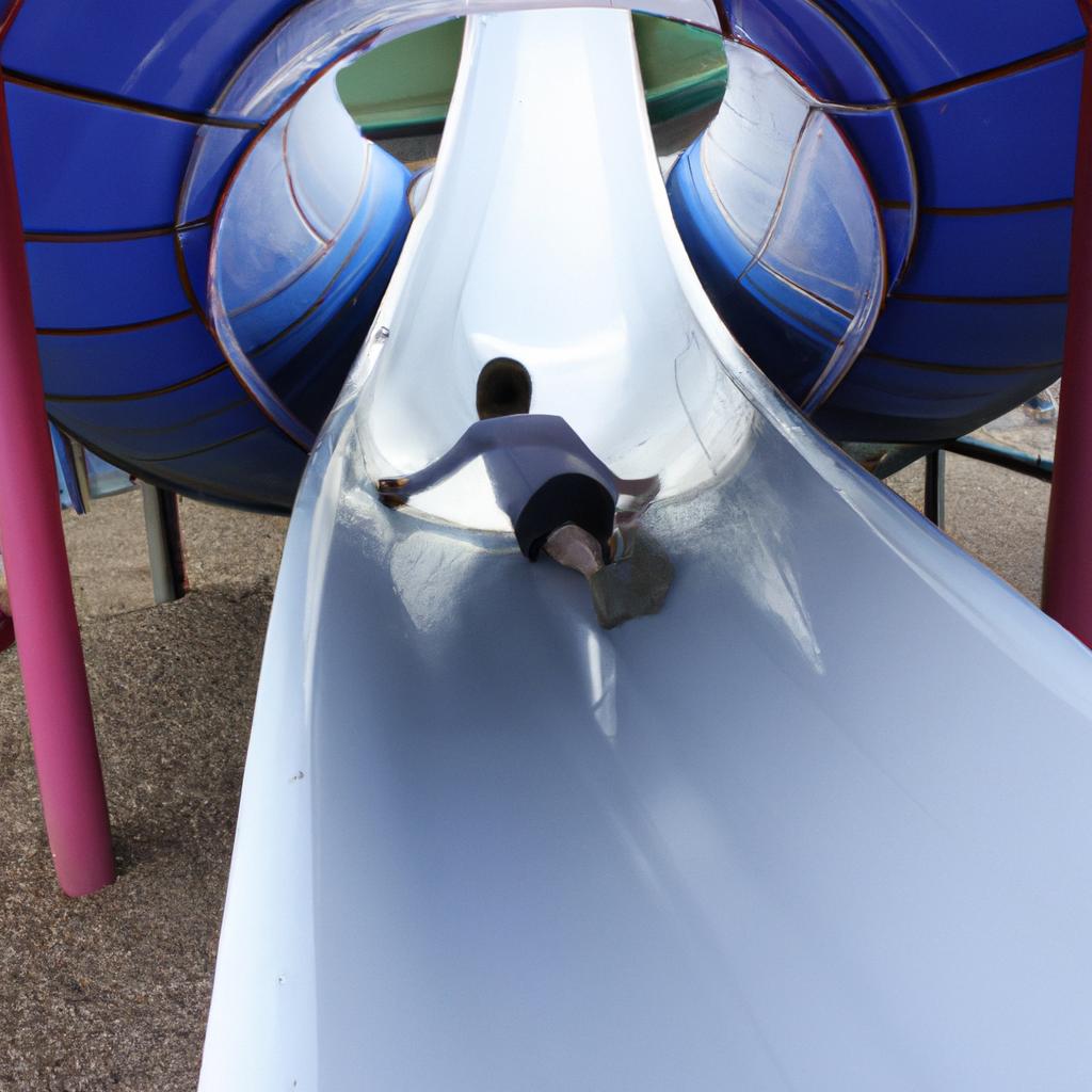Person sliding down curved slide